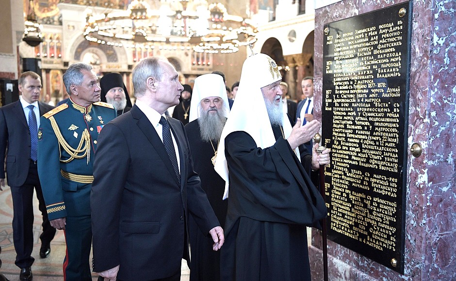 resident Putin tours the Naval Cathedral of St Nicholas with Patriarch Kirill.